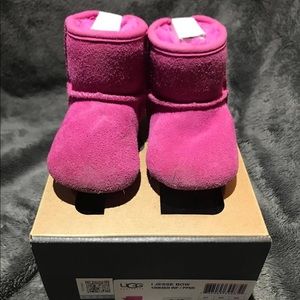 UGG Australia “Jesse Bow” pink boots